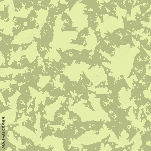 Desert camouflage of various shades of green and yellow colors