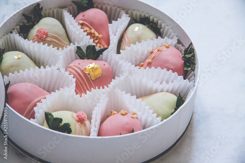 Gourmet chocolate covered strawberries in a round gift box