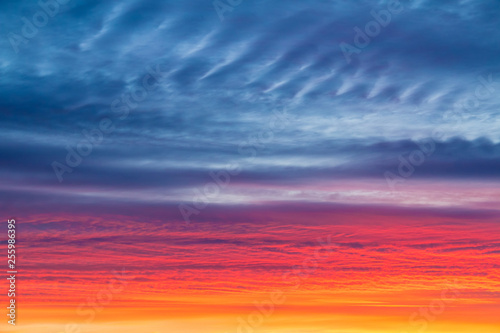 Scarlet sunset with beautiful clouds