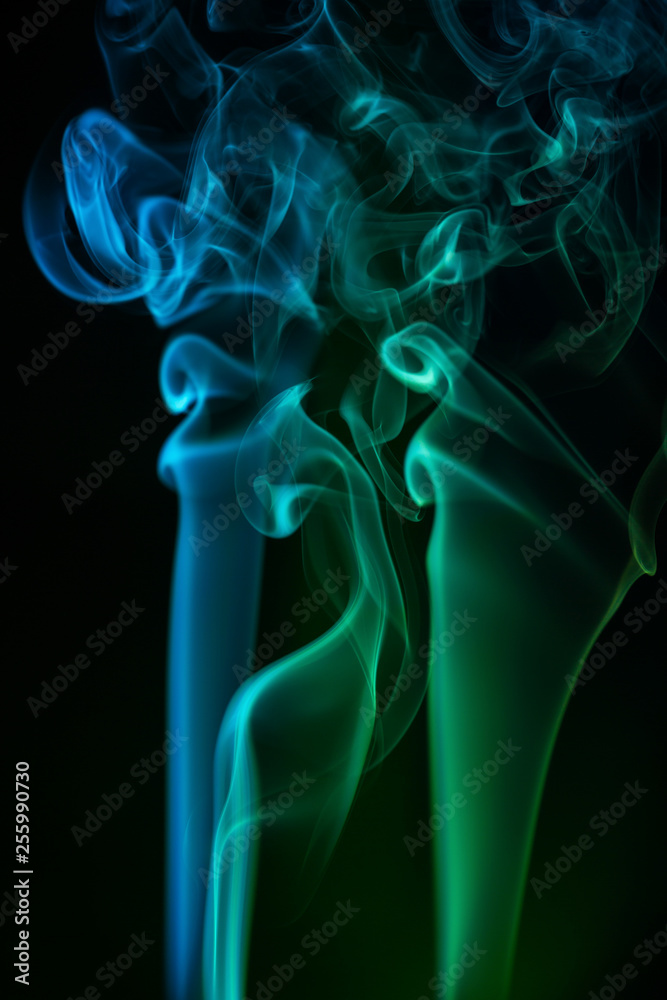 Abstract backgrounds and wallpapers. Colorful smoke on black background. Abstract backgrounds and wallpapers. Colorful smoke on black background.