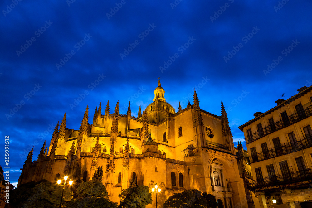 Segovia, Spain – Segovia cathedral in a summer night seen from plaza Mayor. It was the last gothic style cathedral built in Spain, during the sixteenth century.