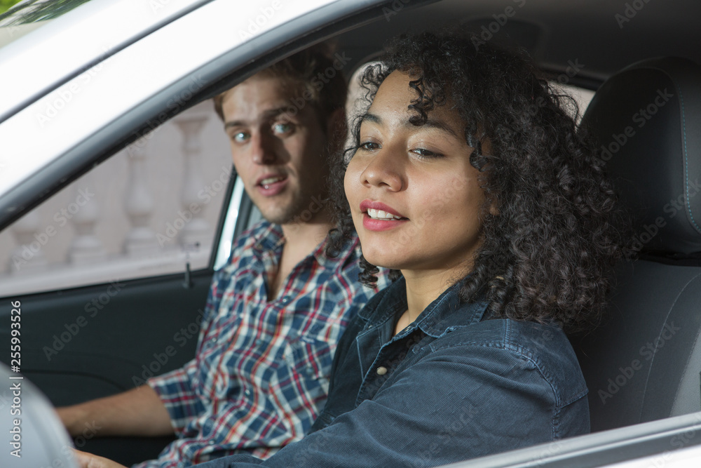 Ethnic couple with a car in the city Ethnic couple with a car in the city