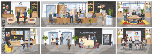 Office building interior. People sitting at the desk