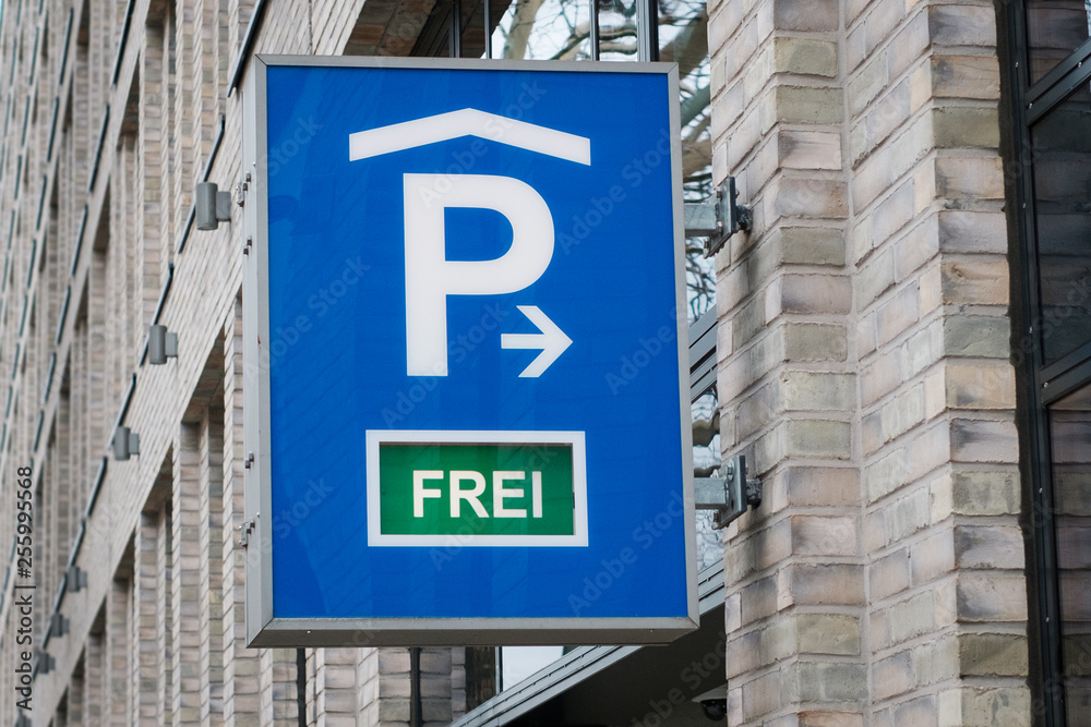 parking sign showing available parking spot (german : frei) - parking lot - parking sign showing available parking spot (german : frei) - parking lot -