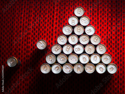  canned coffee is triangles on red background  photo