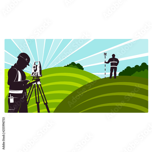Surveyors with a geodimeter working on a green field