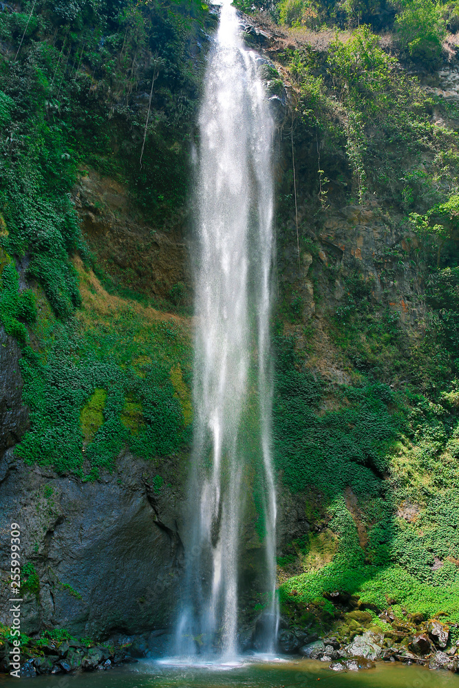 Fototapeta premium Rainbow Waterfall or Cimahi Waterfall (Curug Cimahi) in Java Indonesia