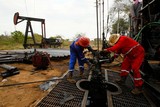 Trabajadores de la Estatal Petrolera de Venezuela. PDVSA en LAgunillas, Estado Zulia. 
