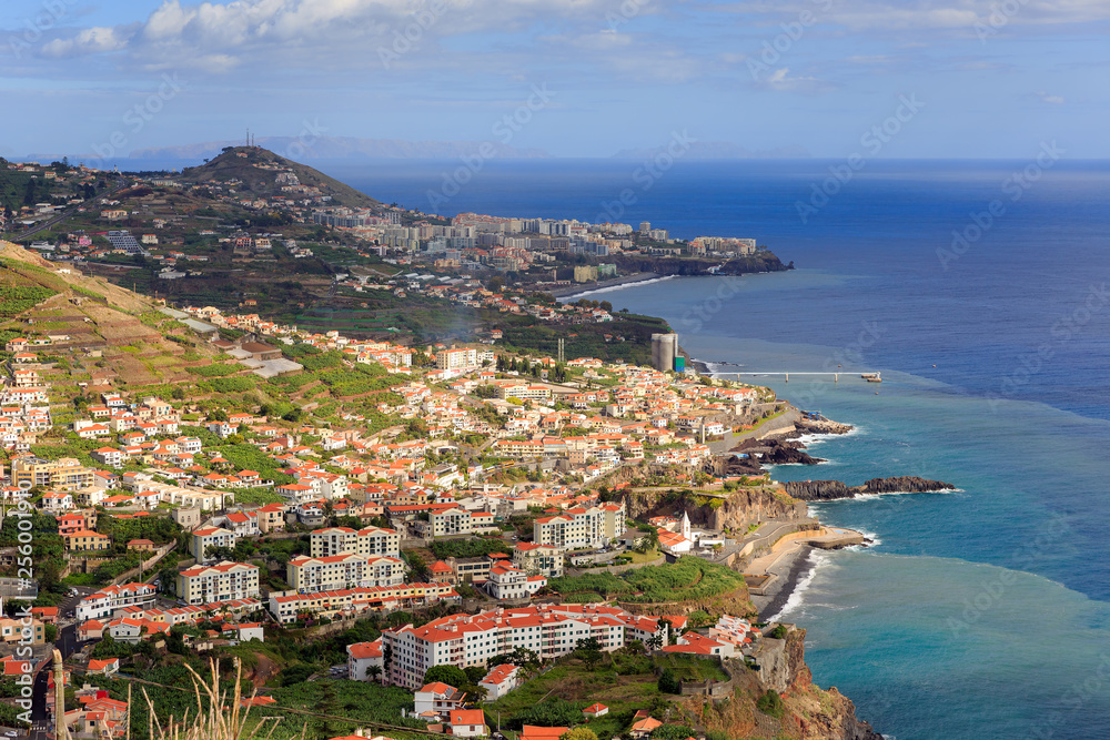 Beautiful panorama landscape of the steep coastline of Madeira on a cloudy summer day