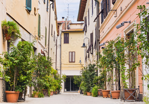 Beautiful street with flowers in the Grosetto town, Tuscany, Italy, Popular touristic destination in Europe