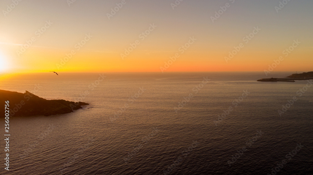 Aerial view of the sea at the sunset