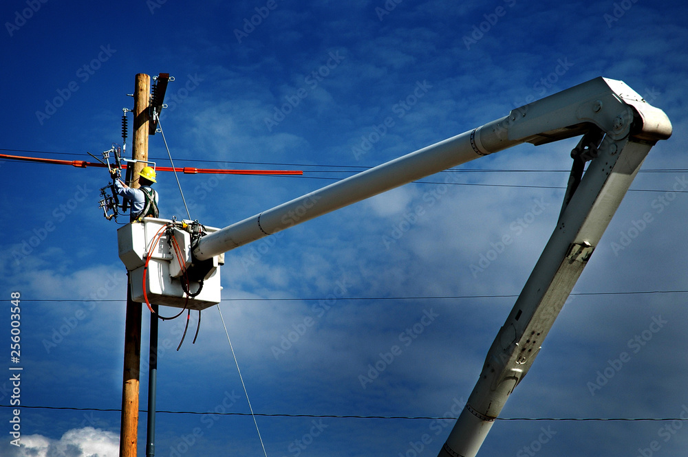Man Worker Working on Power Lines Crane Bucket High in the Air Dangerous Man Worker Working on Power Lines Crane Bucket High in the Air Dangerous