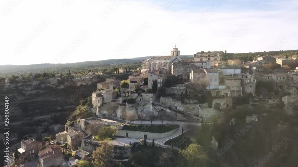 Aerial drone view of Gordes, labelled Most Beautiful Villages of France, perched on a rocky outcrop at the end of the Vaucluse plateau, 4K, UHD Aerial drone view of Gordes, labelled Most Beautiful Villages of France, perched on a rocky outcrop at the end of the Vaucluse plateau, 4K, UHD