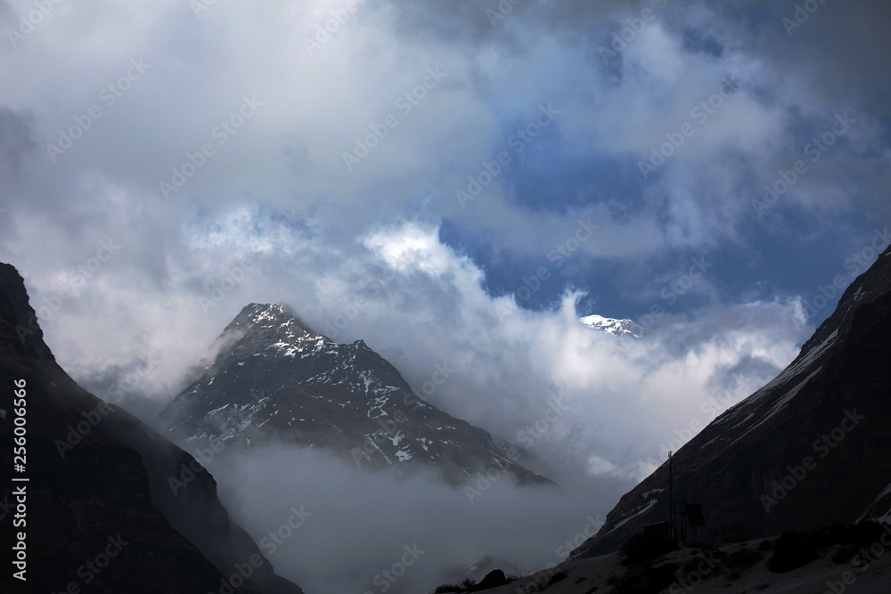 Fototapeta premium Mountains Nepal. Beautiful summer view with sun and blue sky clouds.