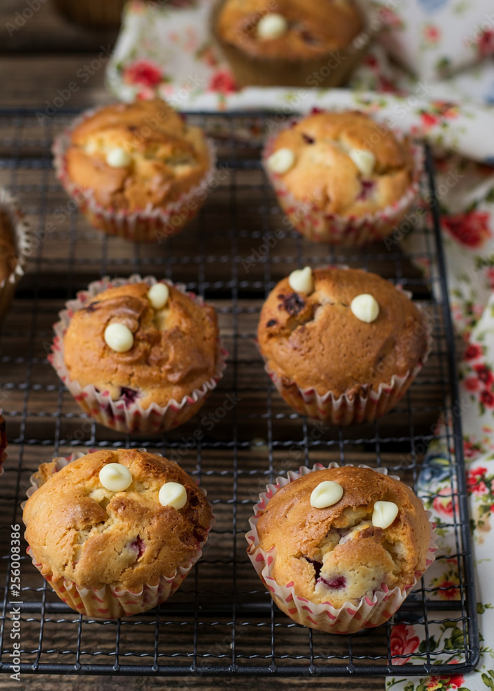 Sweet muffins with raspberries, cranberries and white chocolate chips