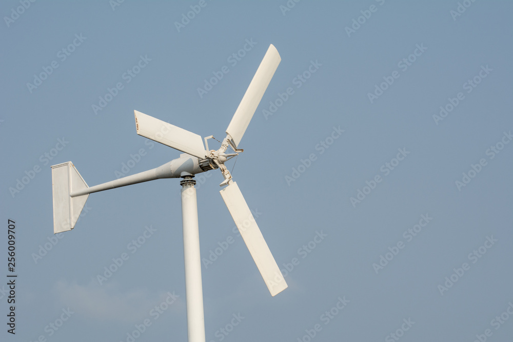 Wind turbine isolated on blue sky background Wind turbine isolated on blue sky background