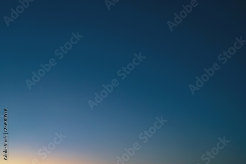 Background sky sunset,love travel to the beach orange tone,Bright in Phuket Thailand,Blue light moment.