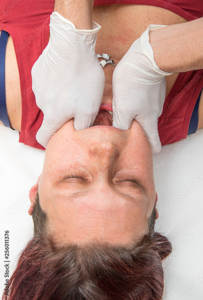 Fototapeta premium woman is doing a osteopathy session