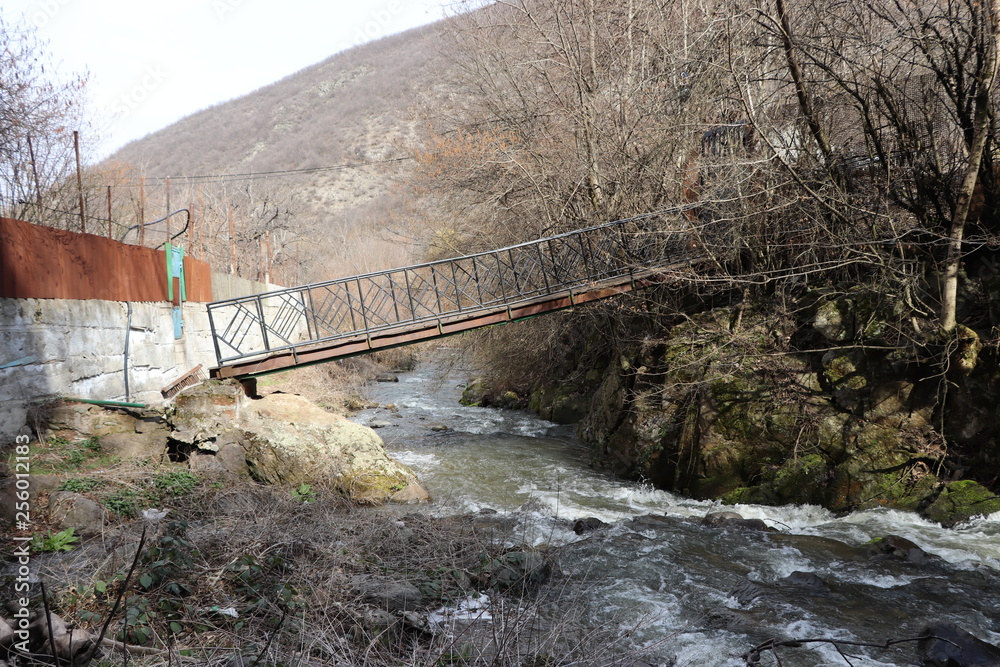 bridge over a mountain river, interesting bridge in the mountains, a unique bridge bridge over a mountain river, interesting bridge in the mountains, a unique bridge