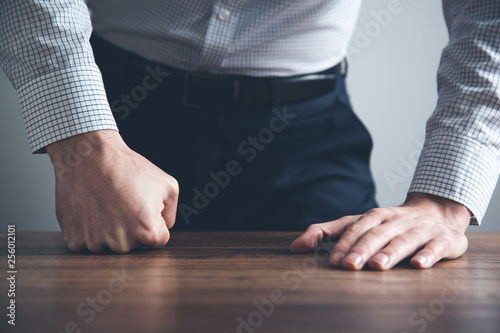 man fists on the desk