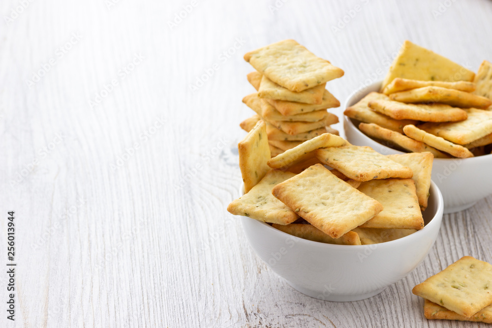 Dry salty cracker cookies in bowl on the table Dry salty cracker cookies in bowl on the table