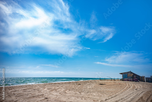 abandoned house on the beach. Summer and Golden sand on the beach photo
