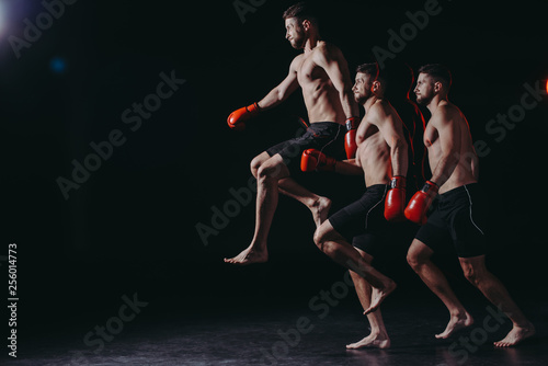 multiple exposure of strong shirtless muscular boxer in boxing gloves jumping high