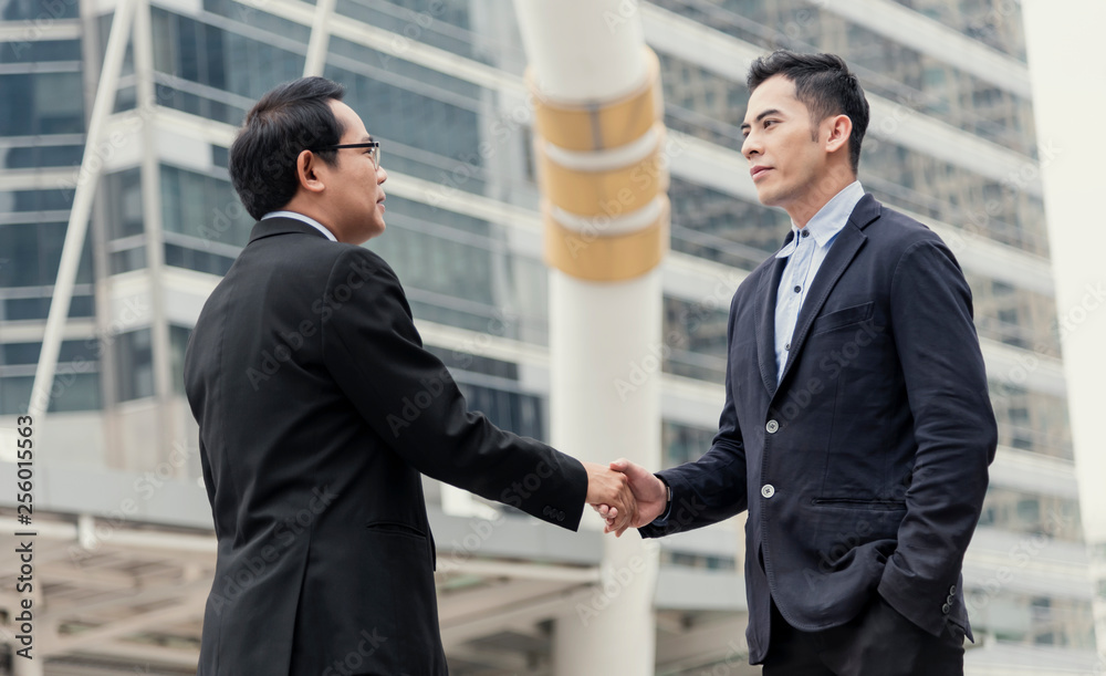 Businessman making handshake agreement. concept cooperation. Businessman making handshake agreement. concept cooperation.