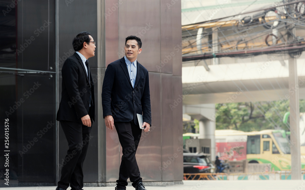 Businessman partner consulting and discussing at outdoor. Businessman partner consulting and discussing at outdoor.
