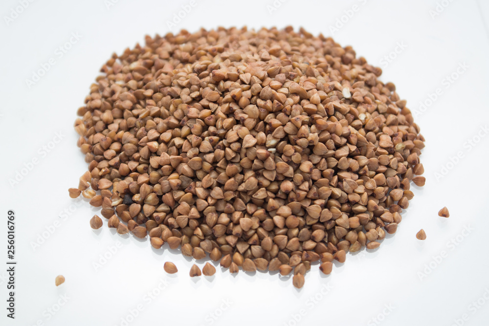 pile of flax seeds isolated on white background