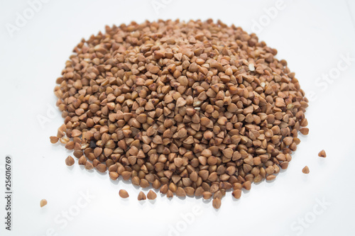 pile of flax seeds isolated on white background