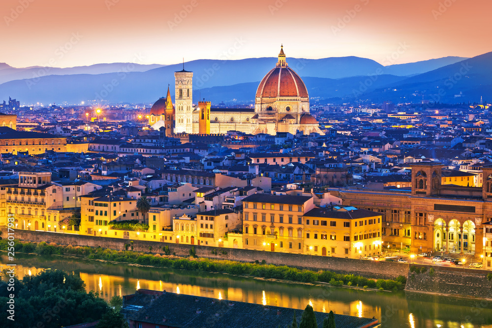 Colorful Florence rooftops and Duomo view at sunset
