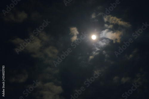 night sky with clouds and sun