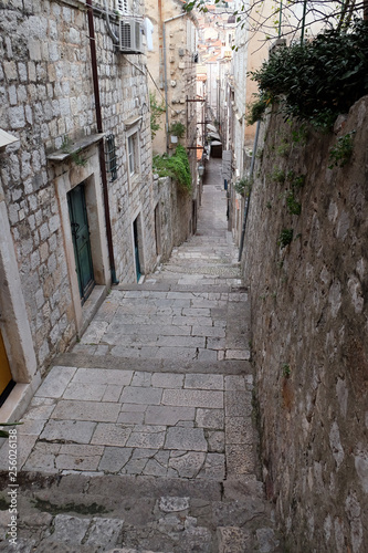 Narrow street inside Dubrovnik old town, Croatia  © zatletic