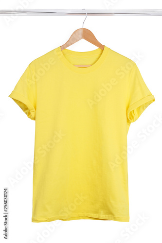Blank yellow t-shirt on hanger isolated on white background