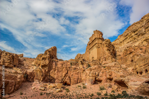 Petra picturesque rocky desert canyon mountain scenery landscape with ancient carved in stone building, travel photography concept