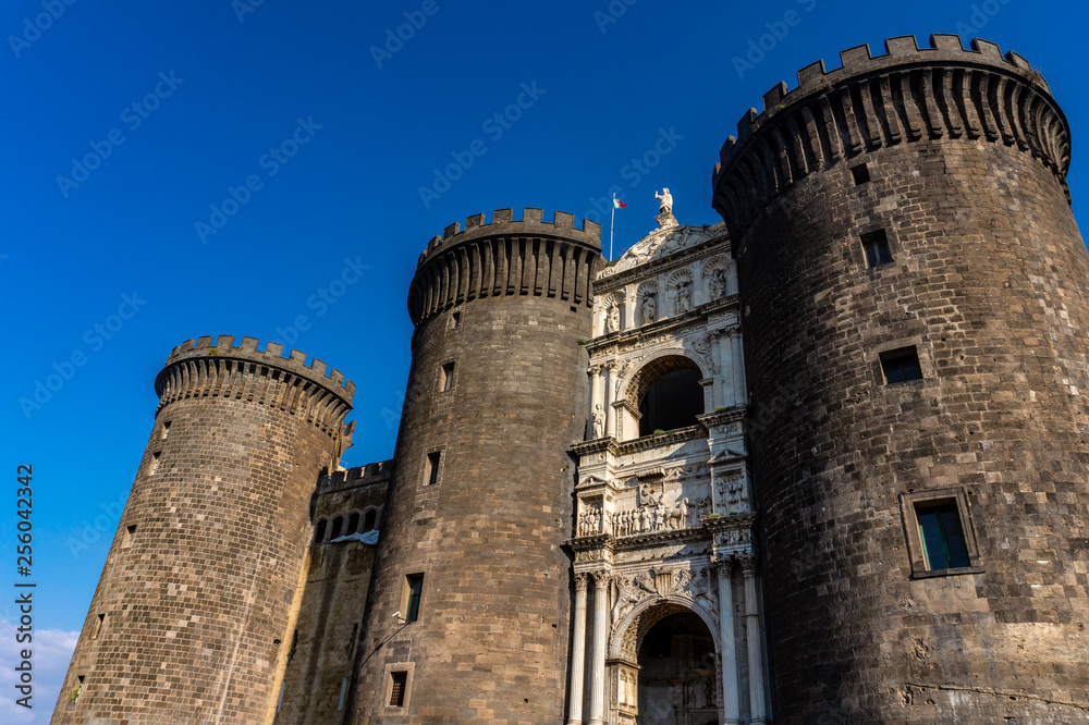 Medieval castle Maschio Angioino in a summer day in Naples