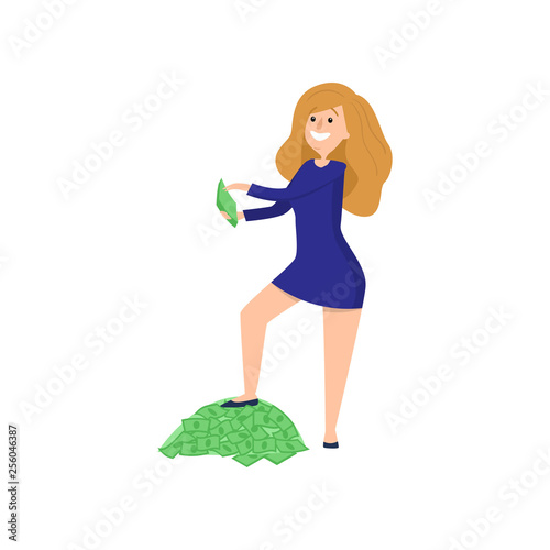 Young redheaded girl put one her foot on pile of money