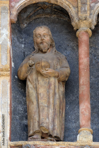 Statue of saint on the south portal of the church of St. Mark in Zagreb, Croatia 