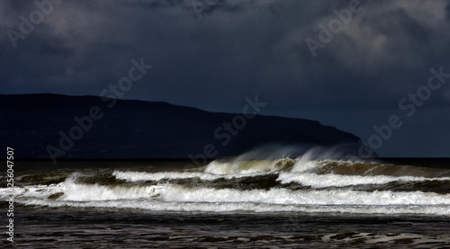 Layers of an incoming tide and storm on the Downhill Beach in the Downhill Demesne in County Londonderry in Northern Ireland. Location of the Game of Thrones shooting