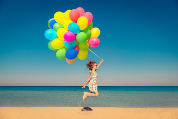 Child enjoys a summer vacation at the sea