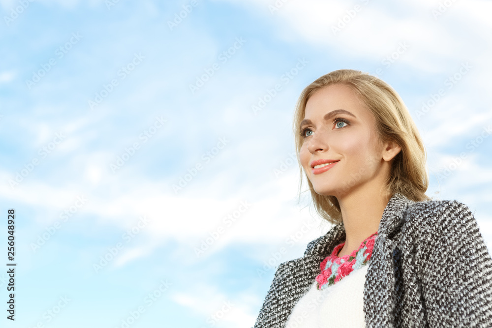 Happy and free. Beautiful happy young woman smiling looking away on a pleasant day outdoors Happy and free. Beautiful happy young woman smiling looking away on a pleasant day outdoors