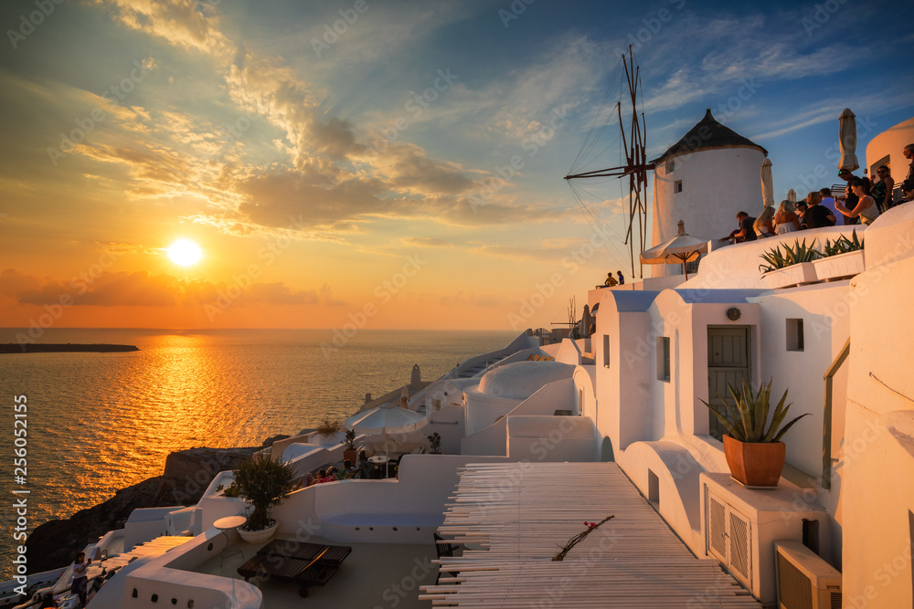 Naklejka premium Santorini greece famous Oia in sunset time golden hour 