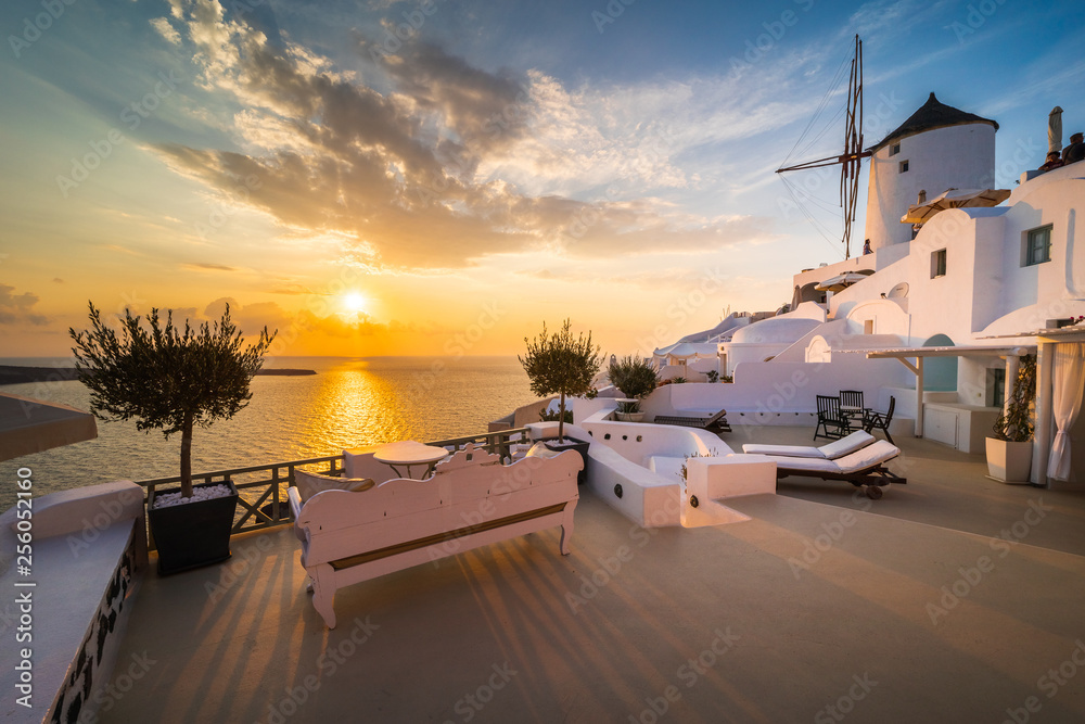 Fototapeta premium Santorini greece famous Oia in sunset time golden hour 