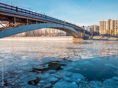 City skyline Moscow with a river at winter time. Shattered ice on the Moscow river at winter time