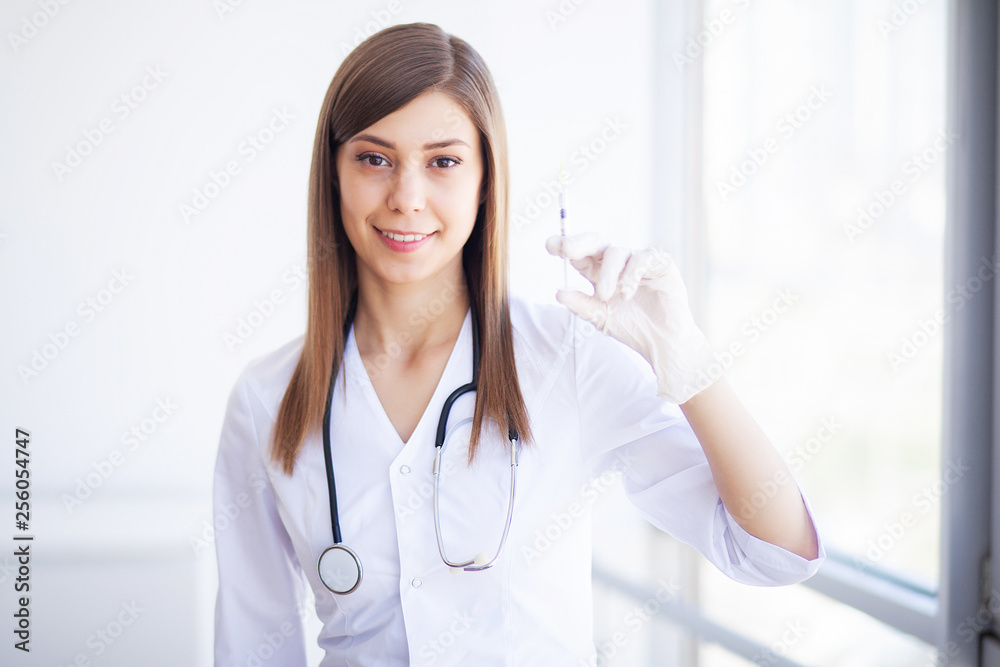 Health concept. Young female doctor on modern clinic background Health concept. Young female doctor on modern clinic background