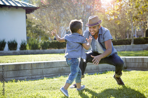 Young boy runs toward his father