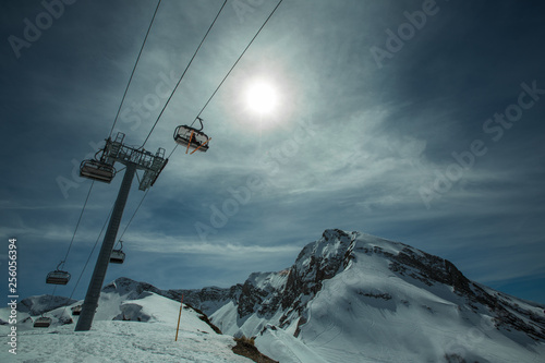 Ski piste panorama with ropeway chair lift