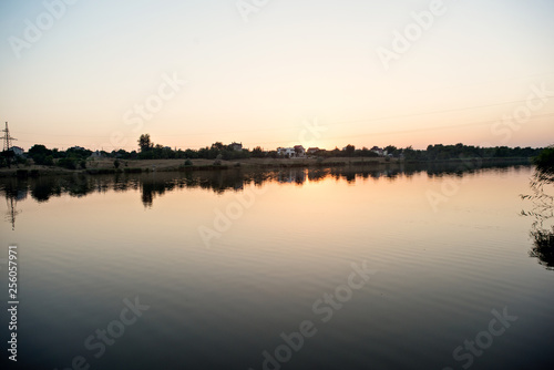 Beautiful sunset on the lake. Beautiful sunrise on the lake. Protect the environment!