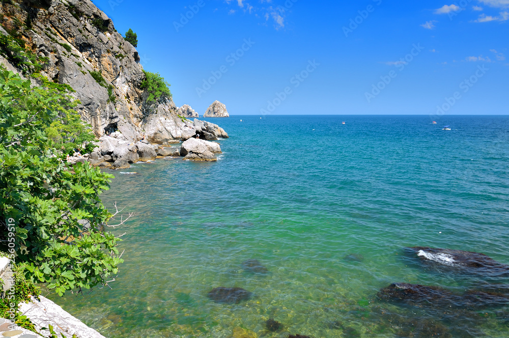 Fototapeta premium Bright summer landscape overlooking the rocky coast of the Black Sea in Crimea, Russia